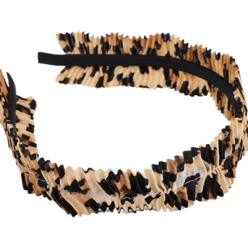 hiuspanta-miny-leopardikuvio-tlVVSyUy-0.webp Miny Hiuskoristeet Ja Hiustenhoitovälineet^Hiuspanta Leopardikuvio